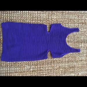 Tight mini Bebe dress with cutouts